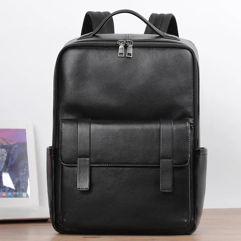 Men's black genuine leather laptop backpack with woven detail and large 36-55L capacity.
