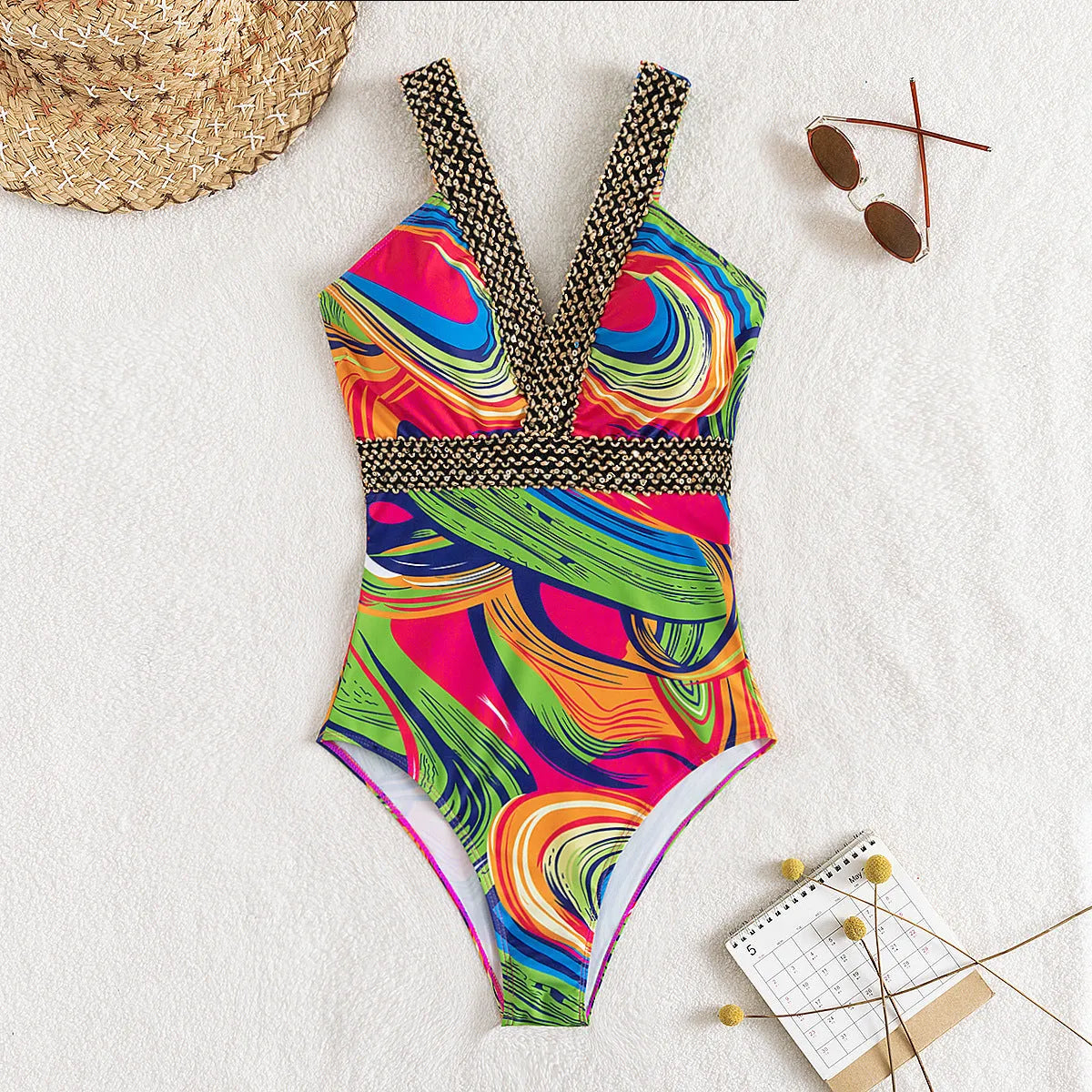 Women's deep V spaghetti strap one-piece swimsuit in polyester with printed pattern, available in multiple colours
