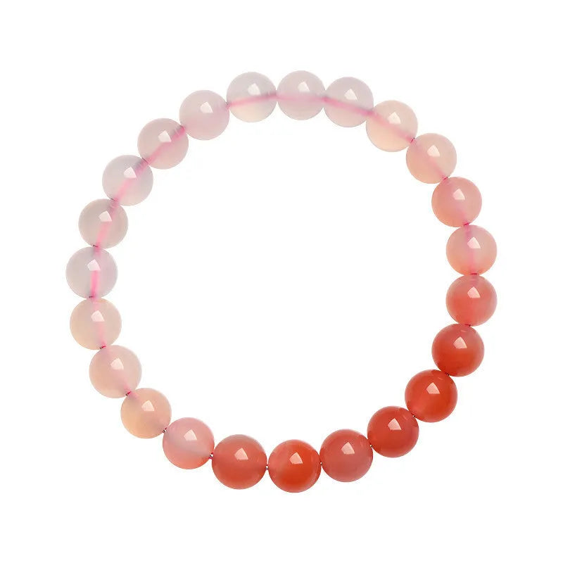 Natural gradient Yanyuan agate bracelet with geometric beads in four size options.