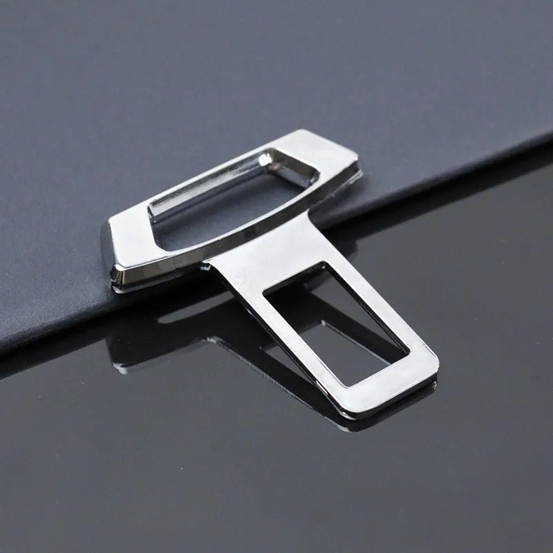 Metal car dashboard silencer insert shown in matte black, gold and silver colour options.
