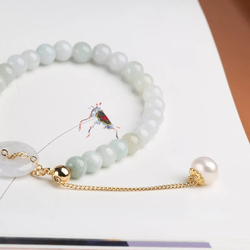 Women's jade bracelet with emerald peace buckle and pearl details in geometric national style design