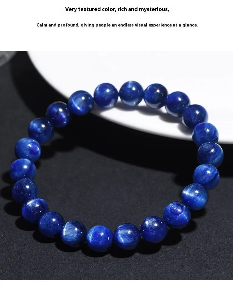 Blue crystal bracelet with geometric shape and Ruyi design element on wrist