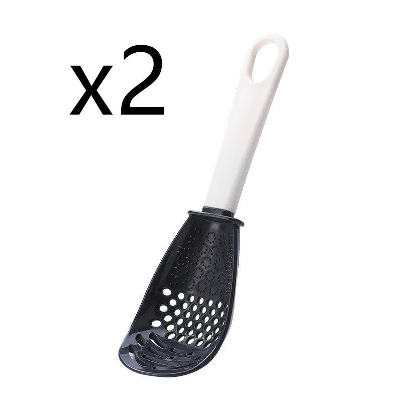 Multifunctional slotted cooking spoon in red plastic with serrated edge and half-enclosed head for scooping rice