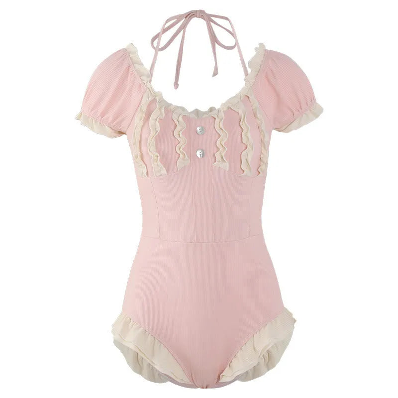Pink women's one-piece swimsuit with Siamese pattern design in conservative cut