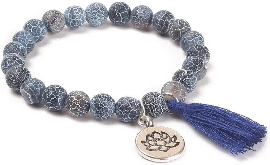 Alloy volcano white turquoise natural stone bracelet with adjustable cord on neutral background