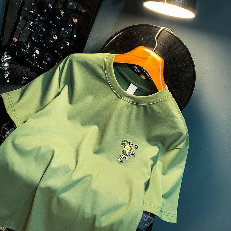 Green men's loose fit T-shirt with a literary print on the front, short sleeves.