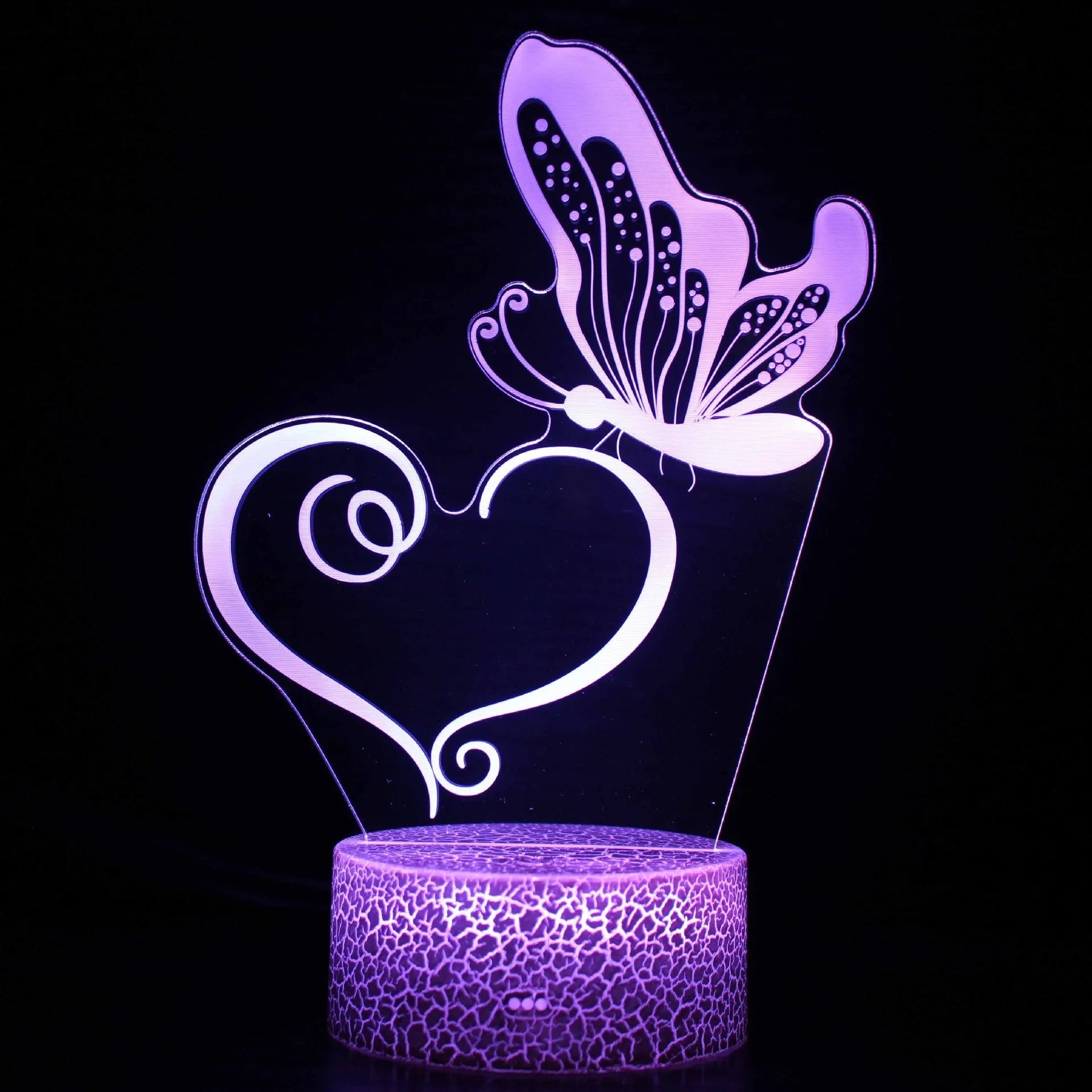 Acrylic 3D table lamp with colourful crack base design and touch controls on wooden surface