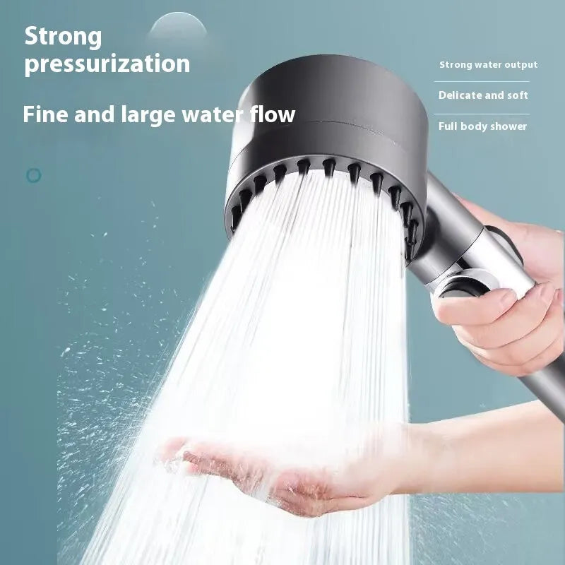 Portable ABS plastic shower head with three adjustment modes on modern bathroom wall