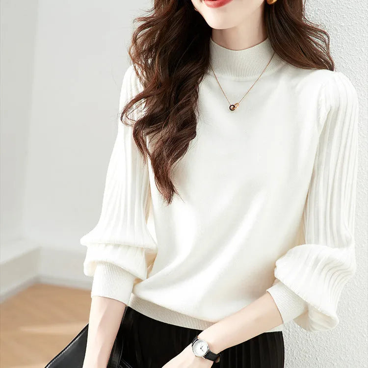 Slim fitting half turtleneck shirt in apricot, black, blue, or white, made from core-spun yarn with spandex.