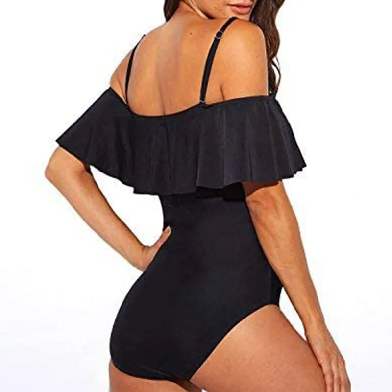 Black one-piece swimsuit with cut-out design and ruffled straps for swimming sports