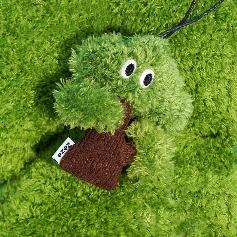 Pine tree shaped fabric cat toy with mint stick inside, measuring 10cm long