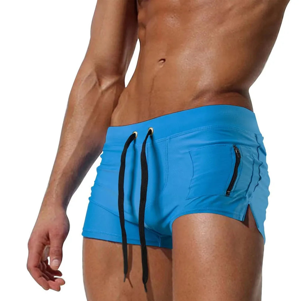 Men's black polyester swimming trunks with high waist and front lace-up closure