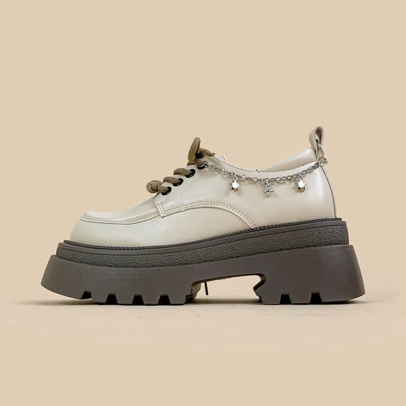 White women's platform Mary Jane shoes with chunky heel and front lace-up fastening.