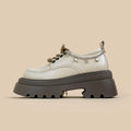 White women's platform Mary Jane shoes with chunky heel and front lace-up fastening.