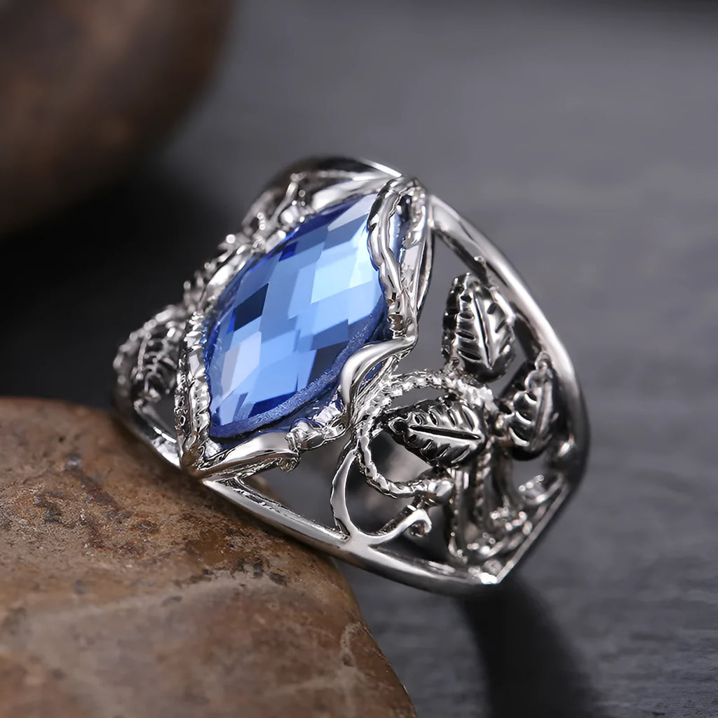 Women's alloy ring with horse eye-shaped blue crystal inlay in geometric style