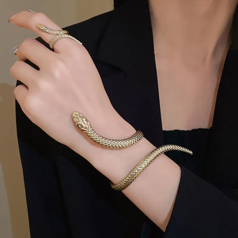 Gold metal ring and bracelet set with exaggerated twisted winding design and simulated snake opening details