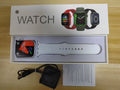 GT20 black alloy smartwatch with silicone strap on wrist, showing heart rate tracking on screen