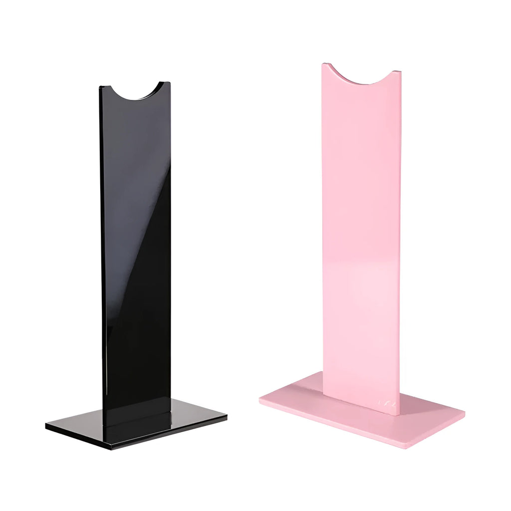 Pink and black detachable headset stand bracket for gaming headphones on a desk