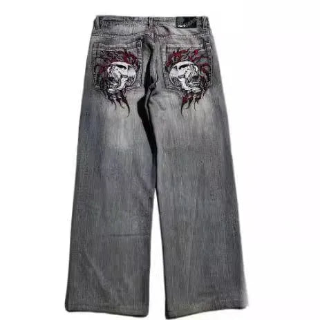Men's grey washed-out wide-leg jeans with a straight-leg workwear design on a neutral background.
