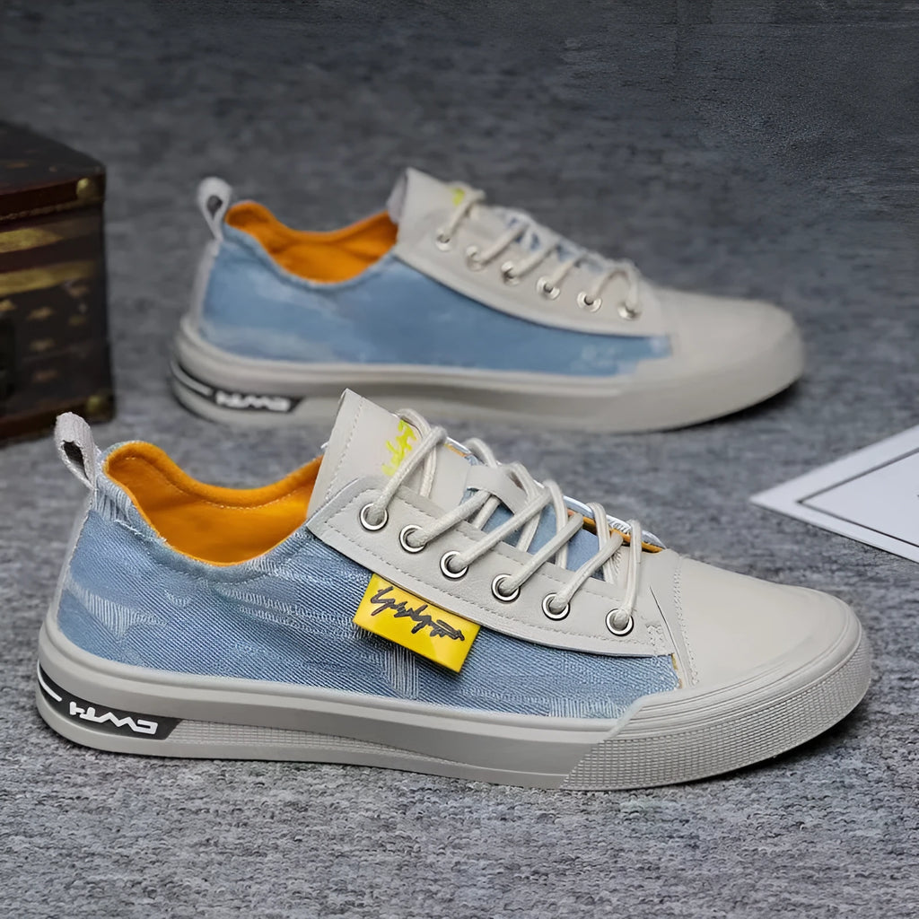 Men's canvas shoes in black, dark blue, and light blue with round toe and rubber sole