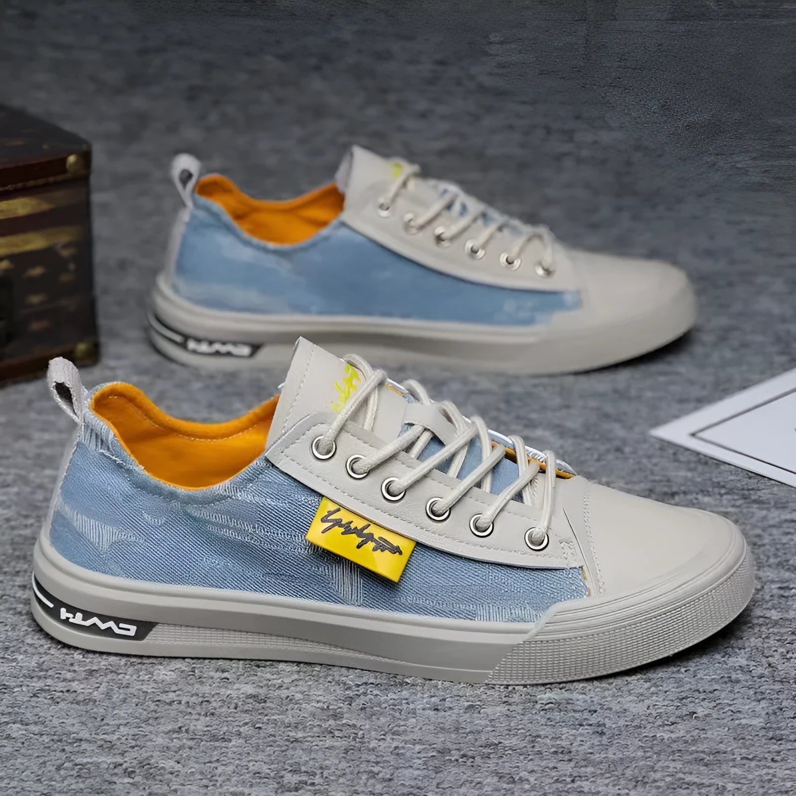 Men's canvas shoes in black, dark blue, and light blue with round toe and rubber sole