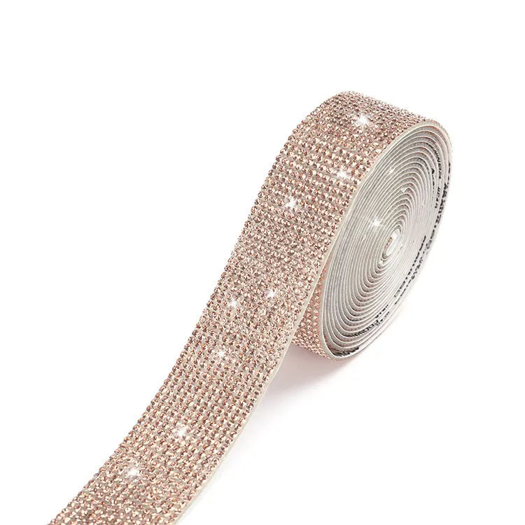 Long strip of self-adhesive electroplated glass water drill stones for clothing decoration.