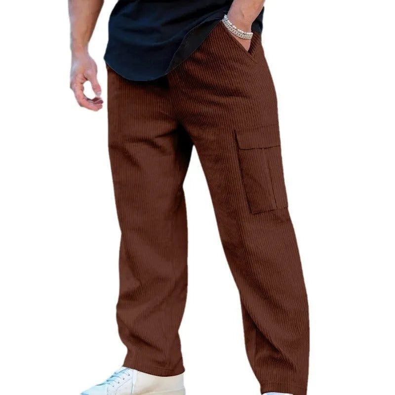 Men's loose-fitting corduroy cargo trousers in navy blue with a drawstring waist and wide straight legs