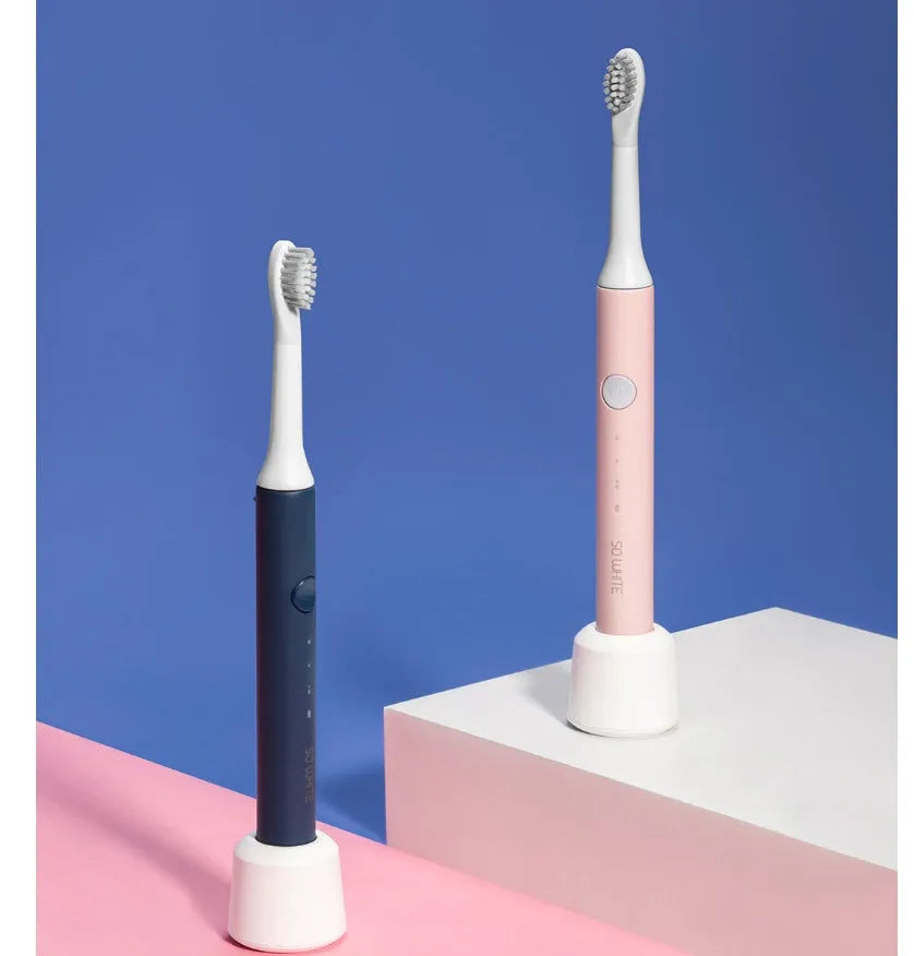 Sonic electric toothbrush with round brush head in blue, IPX7 waterproof handle with power button
