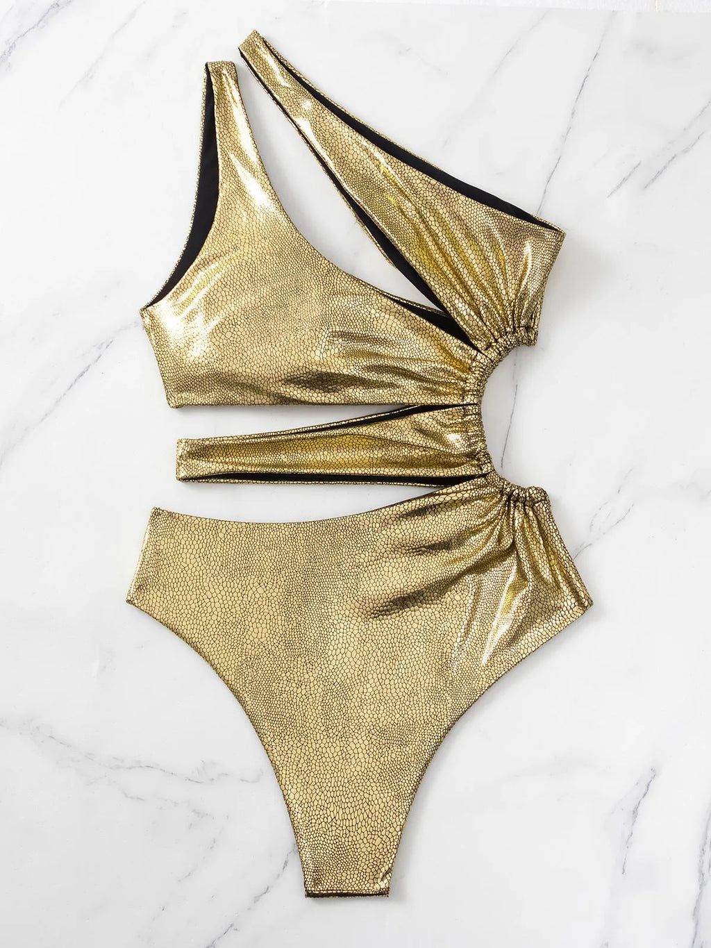 Women's gold backless one-piece swimsuit with sleeveless design