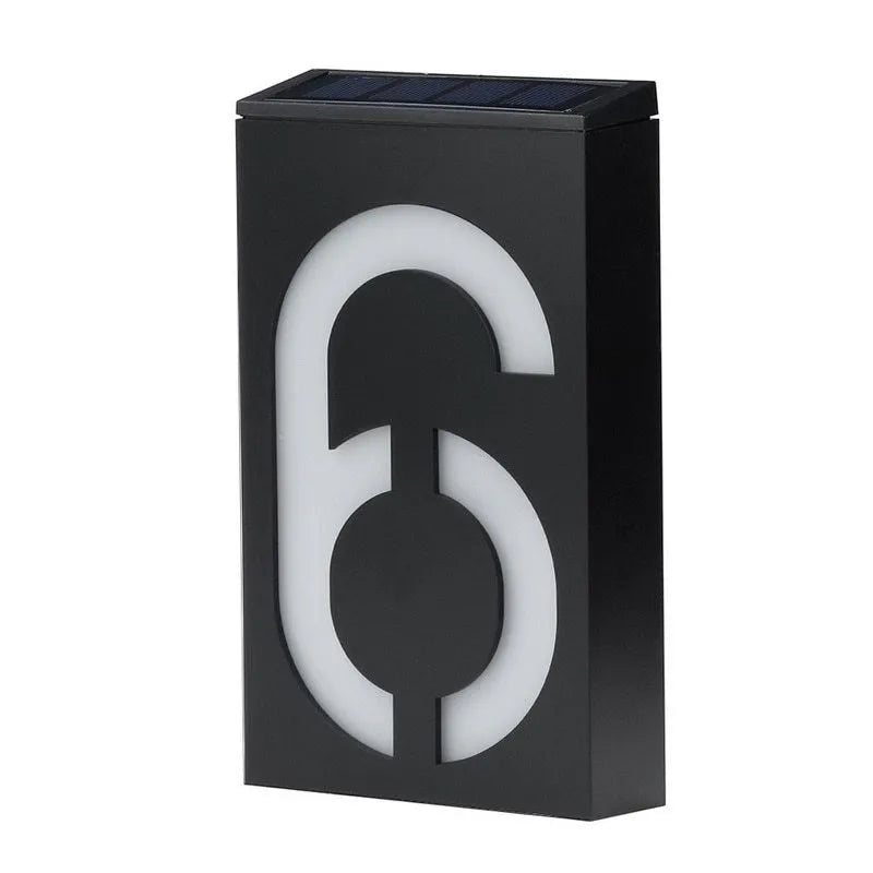 Solar powered LED house number light with IP65 waterproof rating mounted on wall