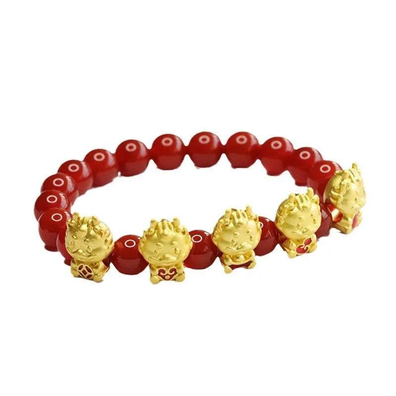 Red agate bracelet with detailed dragon carving on an 8mm bead.
