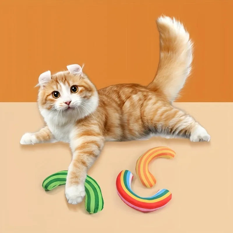 Striped fabric cat pillow toy with a noise maker and catnip strip, measuring 23 cm, in rainbow colours.
