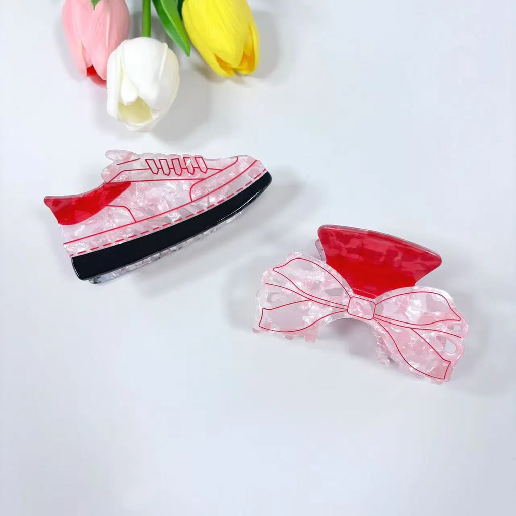 Acrylic bow tie hair grip in cream with glitter oil injection finish, 8cm long, for women
