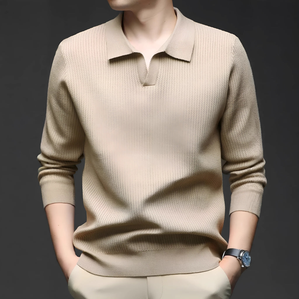 Man wearing a loose green casual pullover sweater for autumn.