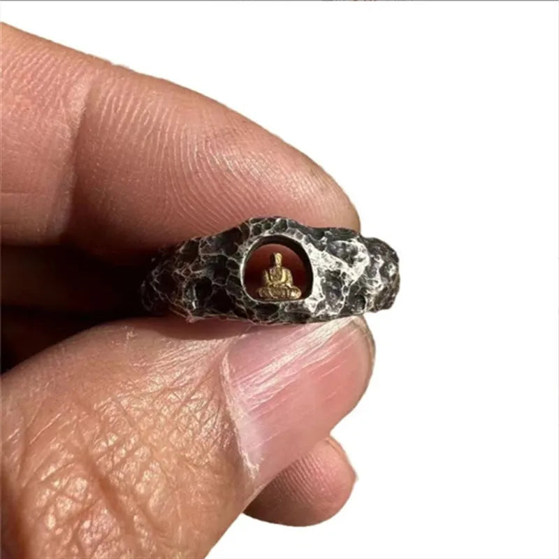 Hand-forged copper Grotto Buddha ring with rock texture and embossed symbol