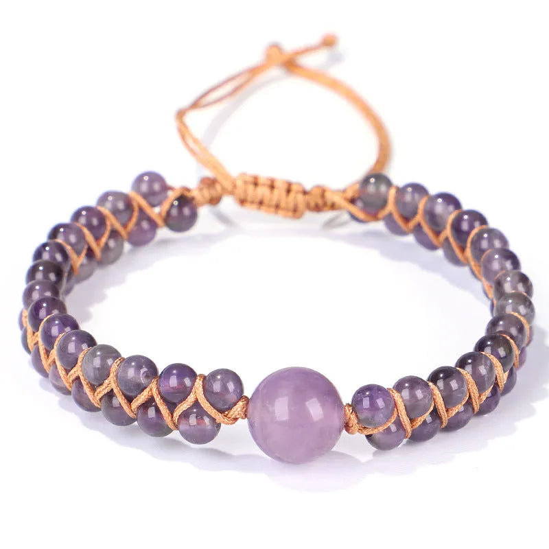 Hand-woven Tigereye gemstone pull bracelet showing geometric pattern and natural stone texture