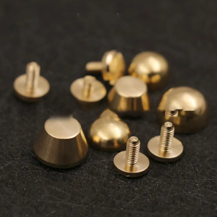 Brass decorative buckle with antique foot nail design in four size variations