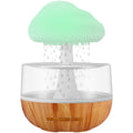 White Raining Cloud humidifier with 7-colour night light and 400ml water tank on a table
