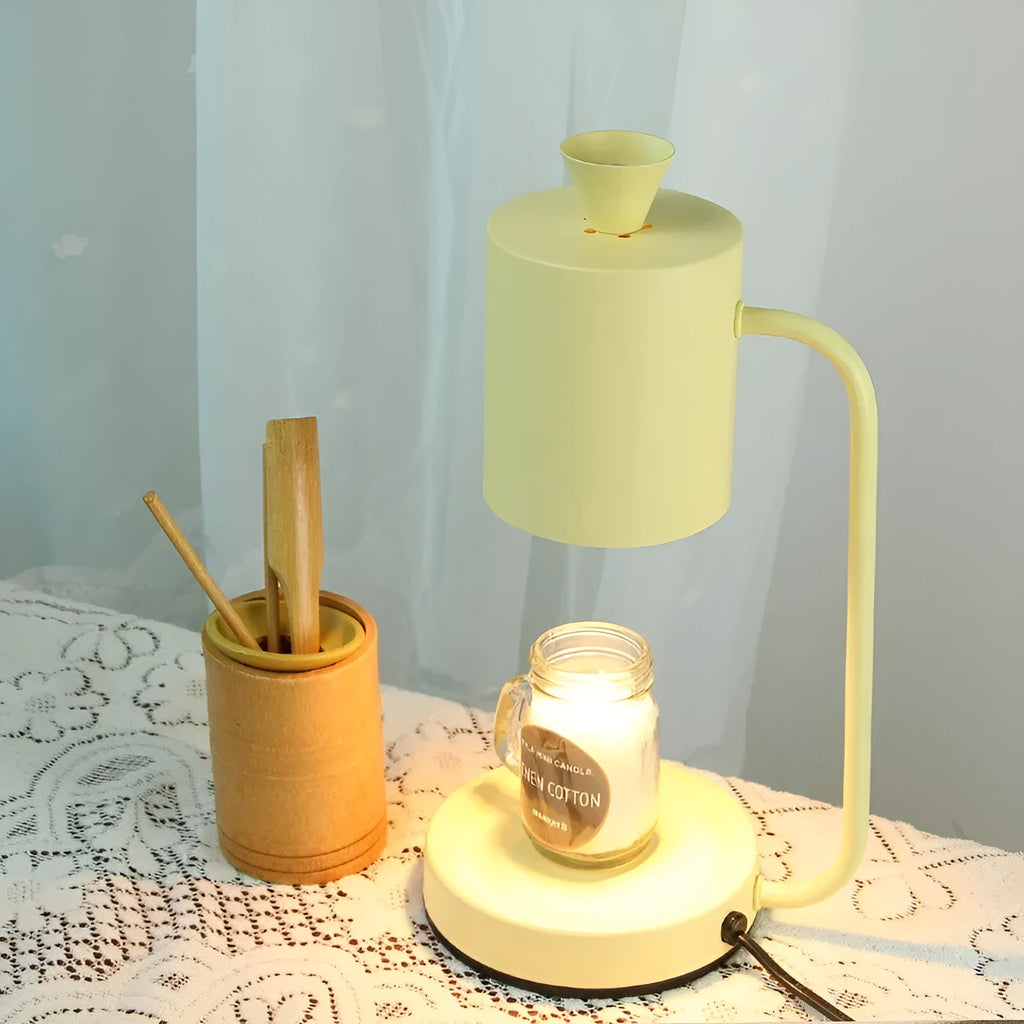 White European-style metal aromatherapy wax lamp with a dimmer switch on a table.