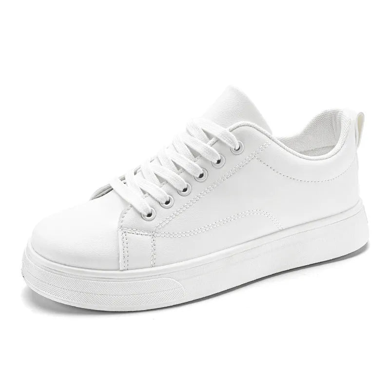 Men's low-top white and black Korean-style casual sneakers with a round toe and rubber sole.