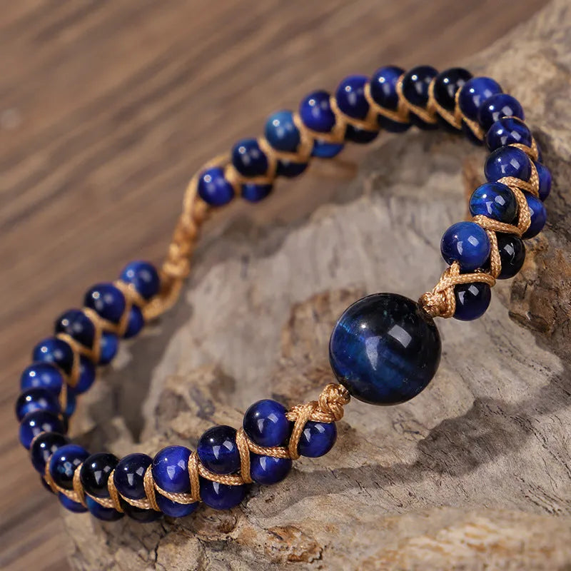 Hand-woven Tigereye gemstone pull bracelet showing geometric pattern and natural stone texture