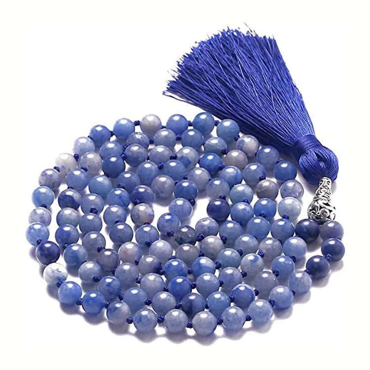 Long agate and amethyst tassel necklace with geometric beads in multiple colours on a 95-100cm chain.