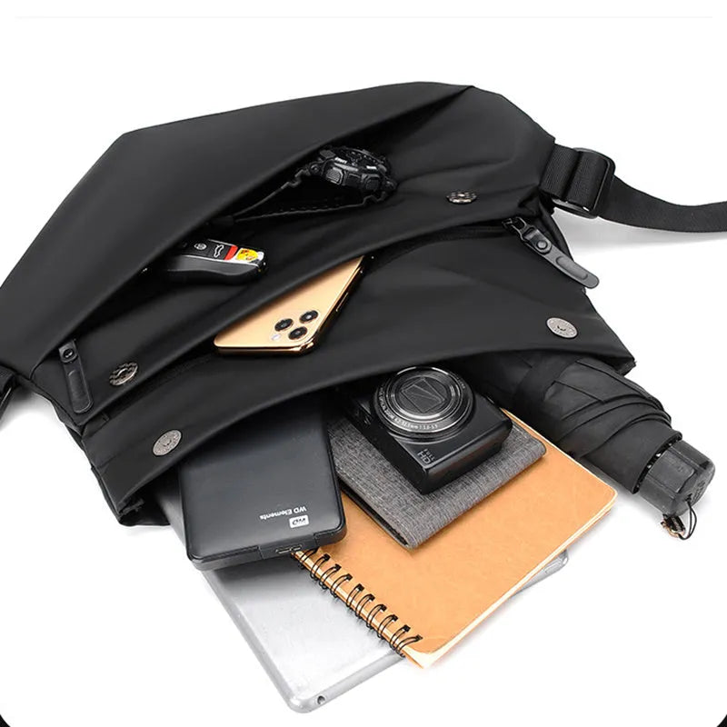 Grey PU leather crossbody bag showing internal phone and document compartments with zip opening