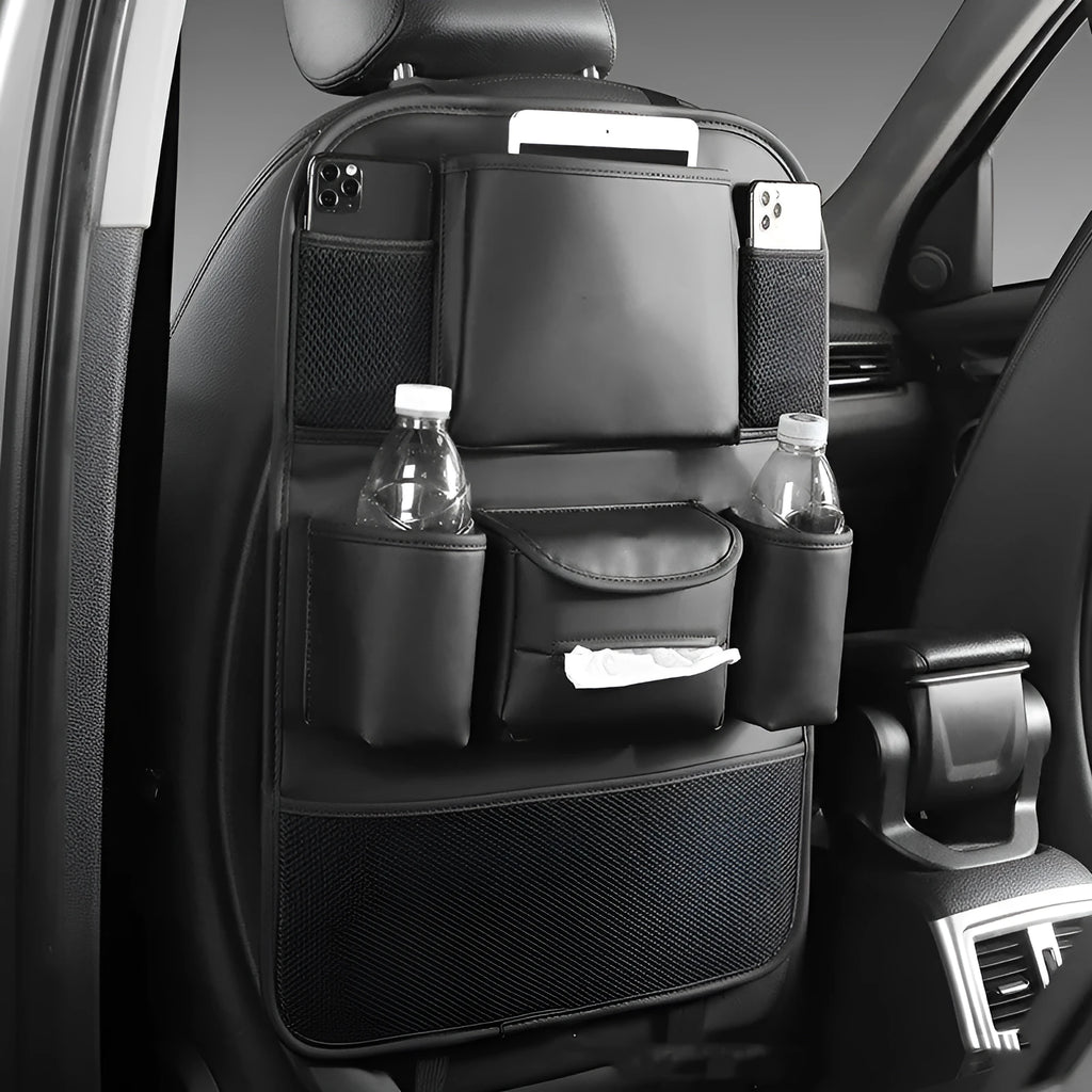 Leather car seat back storage bag in black colour mounted behind vehicle seat