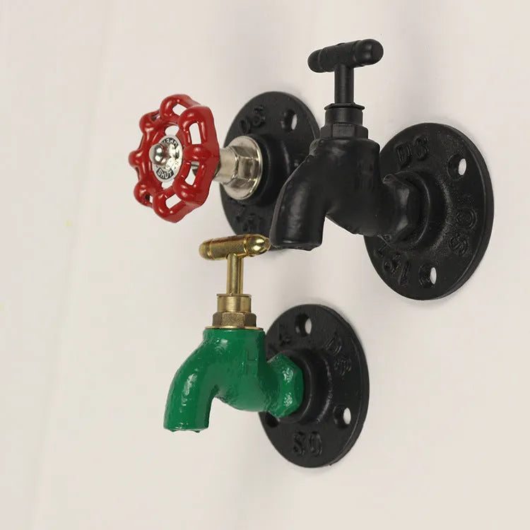 Water pipe style wall mounted towel hook in polished metal with industrial design