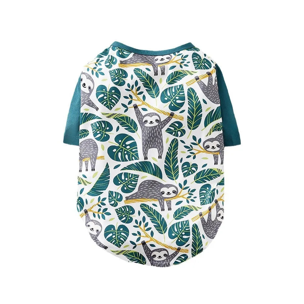 Colourful printed polyester T-shirt for a small dog, showing size chart for S, M, L, XL, and XXL.
