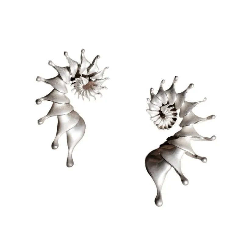Three-dimensional conch stud earrings with matte finish and irregular design