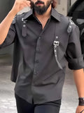 Men's black utility style button-up shirt with regular fit and polyester construction