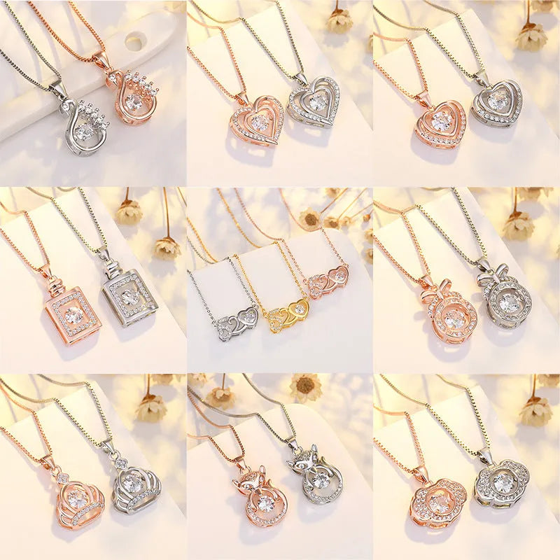 Silver love heart-shaped necklace with crown and bow charms in rose gold or silver finish