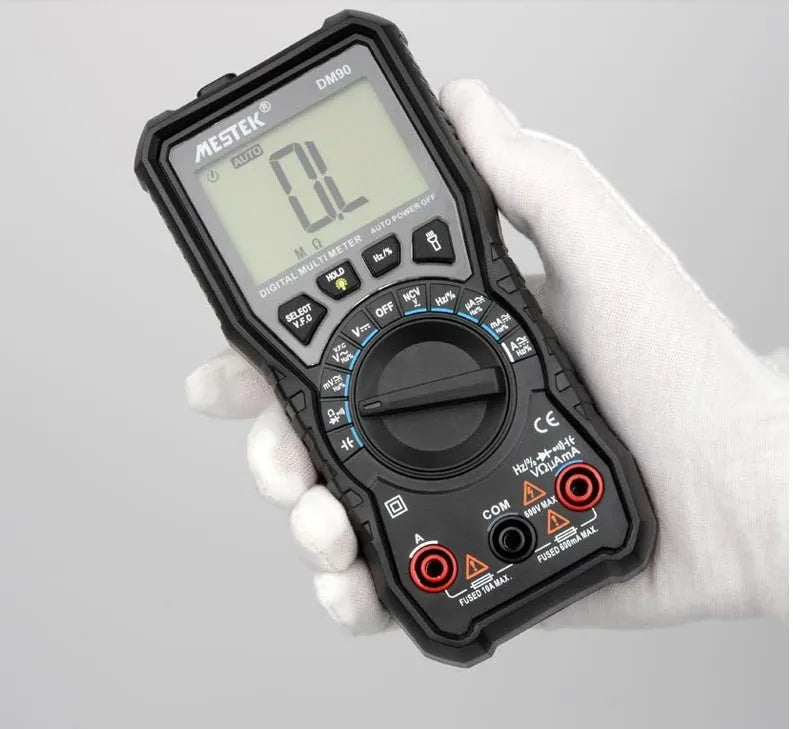 DM90A digital multimeter with display showing measurement, includes test leads for electrical testing
